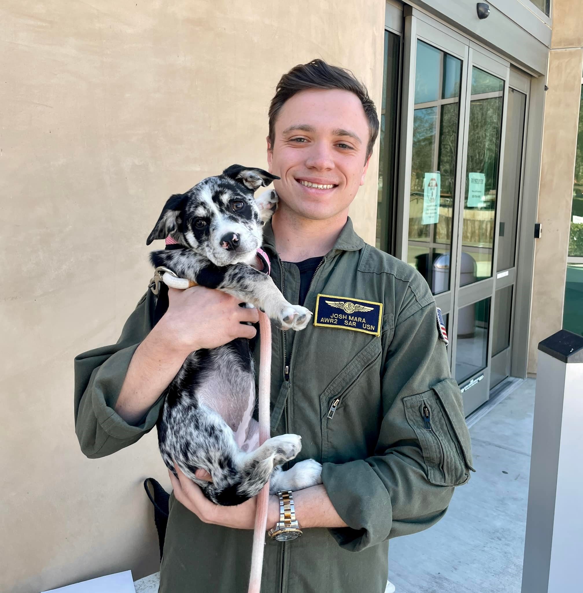 Airforce member with puppy