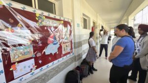 A woman being led on a school tour in India