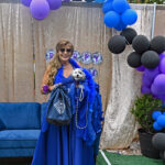 dog and date dressed in blue